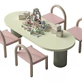 Oval Light Green Children's Table With Pink Chairs And Assorted Kids Toys