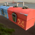 Blue And Red Hardware Toolboxes With Number 24 For Professional Use