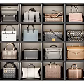 Various Stylish Handbags Neatly Arranged in Grid Display Compartments with Different Colors