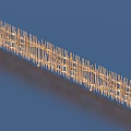 Golden Wooden Garden Fence Ornament Featuring Neat Structure and Blue Backdrop