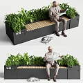 Landscape Bench With Wooden Seat Black Metal Frame Green Plants And Man Reading Newspaper