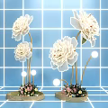 Elegant Floral Art Installation with Large White Flowers Lighting and Blue Grid Background