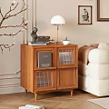 Wooden Bedside Table With Lamp Statue Radio Books And Teacup In Cozy Interior