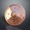 Copper Round Shield With Decorative Relief Rivets And Shiny Surface On Dark Background