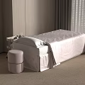 Comfortable Massage Bed with Soft Light-Colored Bedspread Small Stool and Cozy Spa Room Setting 3d model