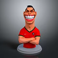 Cartoon Football Player Figurine in Red Jersey with Portugal Logo Arms Crossed on White Base