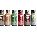 Vibrant Milk Drinks In Assorted Colored Bottles With Black Caps 3d model