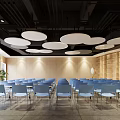 School Assembly Hall With Neatly Arranged Blue Chairs Wooden Bookshelves And Round White Ceiling Lights