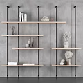 Modern Interior Wall with Floating Wooden Shelves Holding Books Decorative Vases and Sculptures