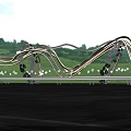 Modern Garden Landscape With Curved Metal Sculptures Green Lawn Pathway And Lighting