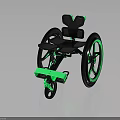 Modern Ergonomic Wheelchair Design With Green Accents On Wheels Footrest And Seat