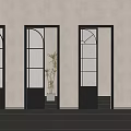 Black Frame Glass Doors With Geometric Patterns Open Middle Revealing Plant And Light Source 3d model