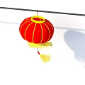 Traditional Red Lantern With Yellow Tassels Hanging On Rod As Household Decorative Item