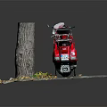 Red Scooter Parked Near Tree Stump With Fallen Leaves On Gray Pavement