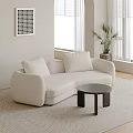 Modern Cream Sectional Sofa with Soft Cushions Black Side Table and Potted Plant Near Window