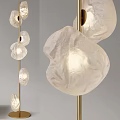 Modern Floor Lamps with Golden Black Poles and Transparent Petal Shades in Minimalist Living Room