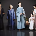 Multi Generational Group of People in Traditional Clothing Ancient Style Gathering with Vase on Table