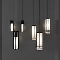 Multiple Modern Long Cylindrical Pendant Lights With Black Frame White Shade Against Gray Wall 3d model