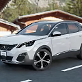 White Peugeot SUV Exterior Design With Black Wheels Parked On Road And Mountain View