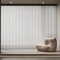 Modern White Vertical Blinds in Minimalist Interior with Beige Bean Bag Chair