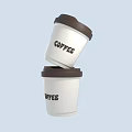 Art Installation Featuring Stacked Tilted Coffee Cups With White Body Brown Lids And Coffee Text