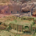 Ancient Rock-Cut Ruins In Red Rock Cliffs Historical Site With Cave Structures