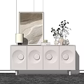 White Console Cabinet With Circular Door Design Table Lamp Vase Books And Artwork