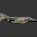 F 4 Fighter Jet Model With Camouflage Paint Missiles Under Wings On Black Background
