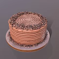 Delicious Chocolate Cake With Spiral Cream Decoration And Chopped Chocolate Sprinkles On Round Tray