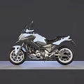 Modern White And Black Sport Touring Motorcycle With Streamlined Body Windshield And Alloy Wheels