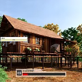 Wooden House Elevated on Stilts with Brown Roof and Natural Surroundings