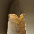 Textured Stone Wall Lamp With Warm Glow And Modern Artistic Design