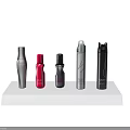 Hair Care Styling Products On White Display Stand With Various Colors