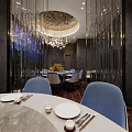Elegant Private Dining Box With Round Table Blue Chairs Chandelier And Green Plants