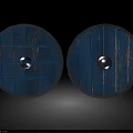 Pair of Blue Round Medieval Shields Featuring Rustic Wooden Texture And Edge Metal Accents