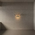 Modern Wall Lamp Design On Concrete Wall With Curved Arms And Sleek Light