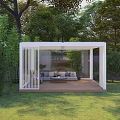 Garden Pavilion With Cozy Seating Lush Trees Green Lawn Brick Wall And Sunset Sky In Backyard