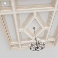 Ornate Light Colored Ceiling With Wooden Frame Geometric Pattern And Chandelier