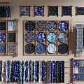 Blue And White Ceramic Plates Textile Fabrics On Display Shelves With Patterns 3d model