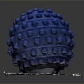 Blue Textured Fitness Massage Ball With Raised Dots On White Paper