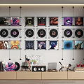 Headphones and Speakers Display with Vinyl Records and Record Covers on Wall Shelves