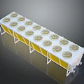 Industrial Equipment With Multiple Circular Components On Long Yellow And White Rectangular Frame