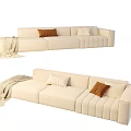 Beige Sectional Sofa with Brown Striped Pillows and Throw Blanket Modern Design