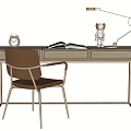 Modern Desk With Chair Alarm Clock Open Books Small Figurine And Table Lamp