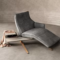 Modern Gray Lounge Chair With Side Table Books And Soft Blanket In Minimalist Interior