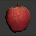 Fresh Red Apple with Yellow Stripes Shiny Surface Brown Stem Dark Background Juicy and Ripe