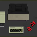 Vintage Computer Setup With Old Style Monitor Keyboard Disk Drive And Red Joysticks