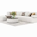 White Sectional Sofa With Brown Throw Pillows Round Coffee Table And Gray Rug 3d model