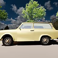 Vintage Yellow Car Parked Along Roadside With Green Trees And Blue Sky