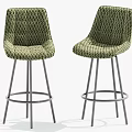 Stylish Green Woven Bar Stools Featuring Metal Legs and Circular Footrest
